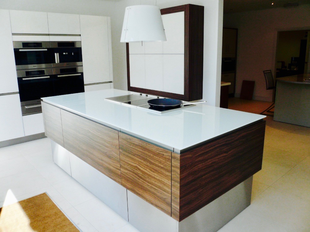 white glass kitchen island unit glass counter top